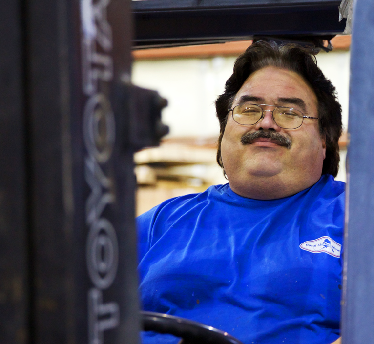smiling forklift driver