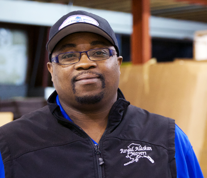 manager smiling in warehouse