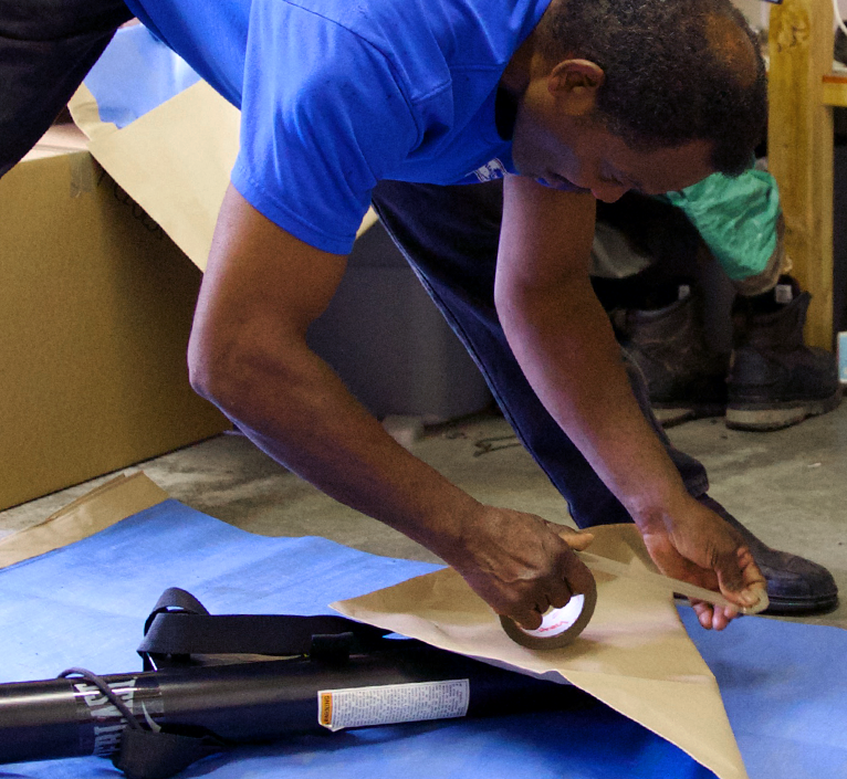 mover taping up furniture