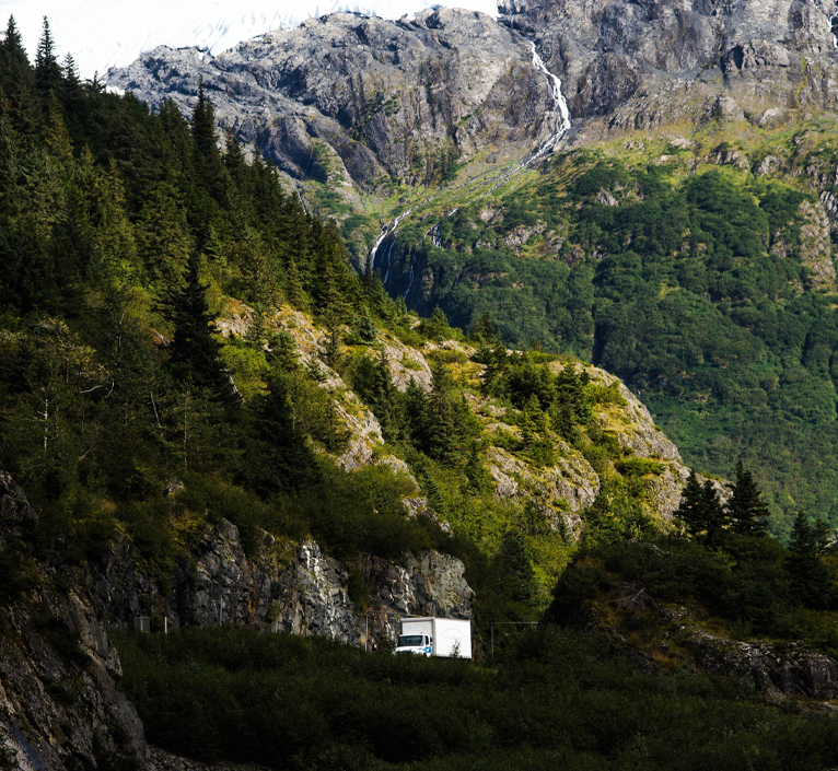 royal alaskan movers truck mountain road